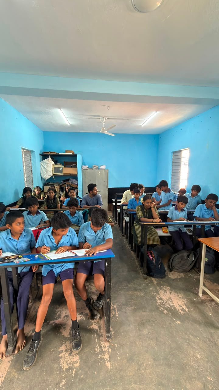 Students participating in artwork activity during Independence Day programme at Shanthipura