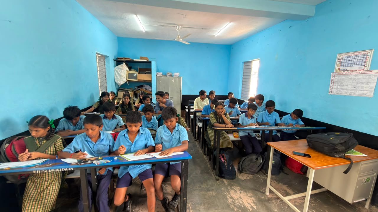 Students participating in artwork activity during Independence Day programme at Shanthipura