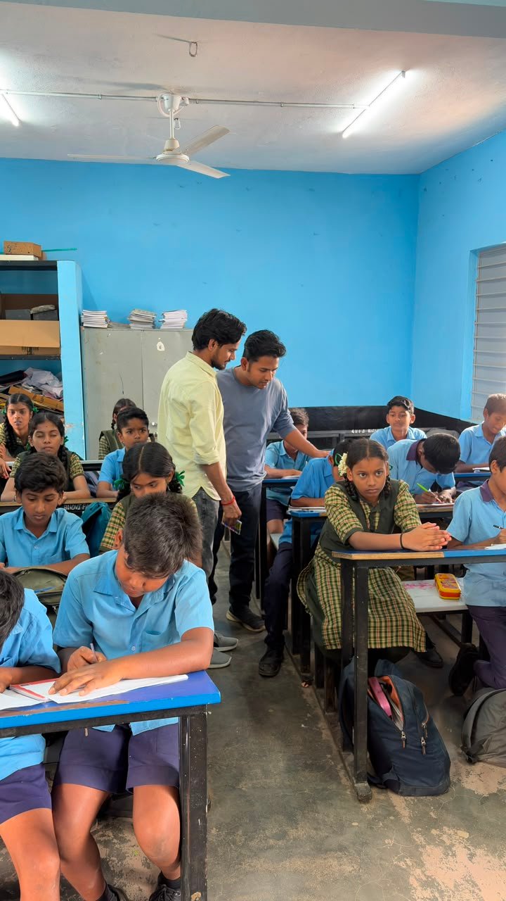 Students participating in artwork activity during Independence Day programme at Shanthipura
