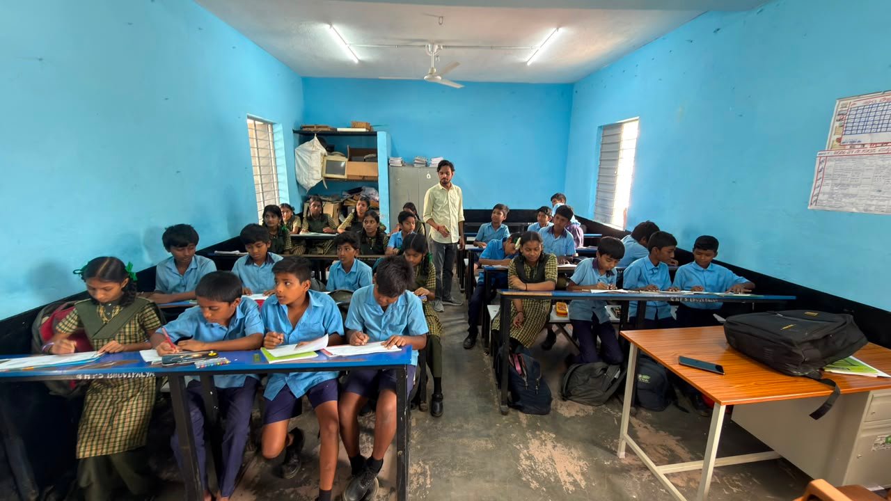 Students participating in artwork activity during Independence Day programme at Shanthipura