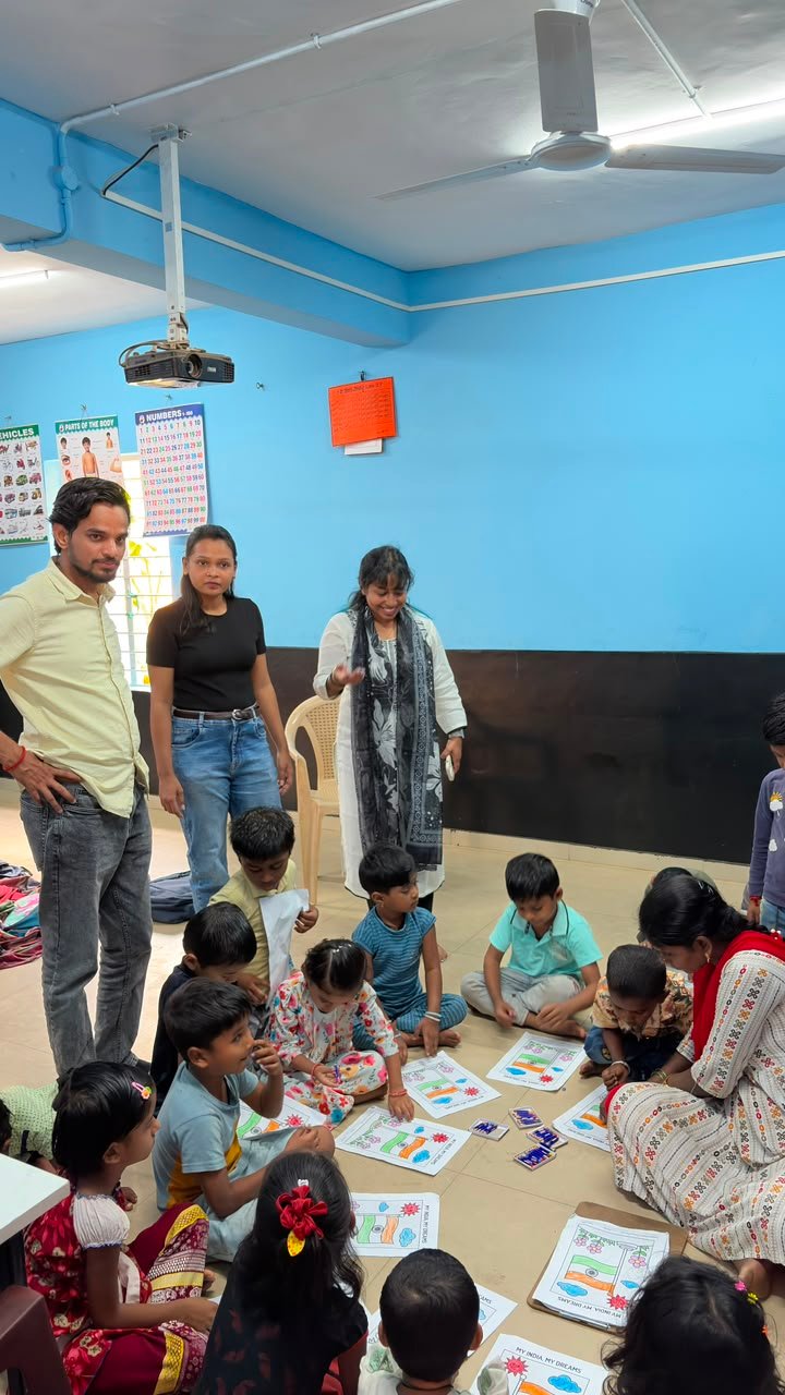 Students participating in artwork activity during Independence Day programme at Shanthipura