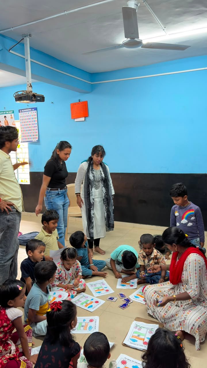 Students participating in artwork activity during Independence Day programme at Shanthipura