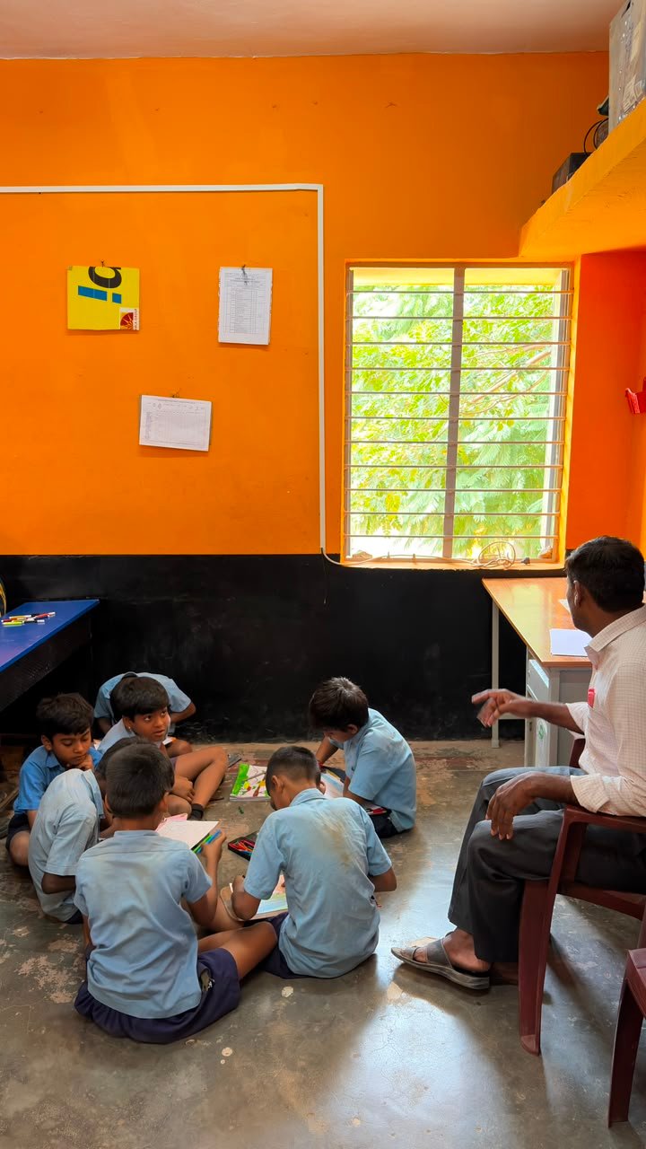 Students participating in artwork activity during Independence Day programme at Shanthipura
