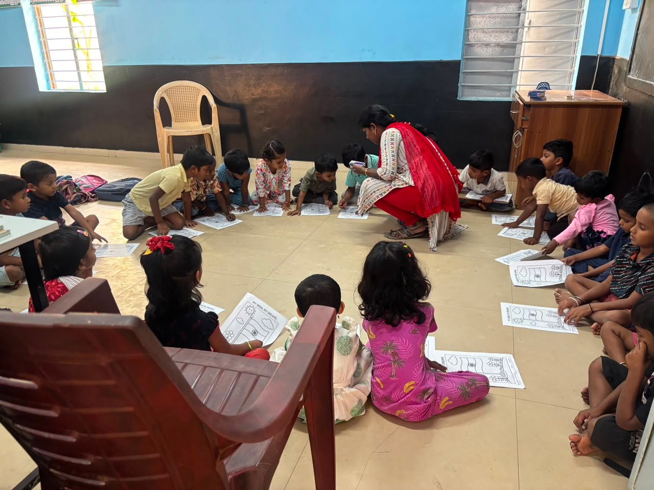 Students participating in artwork activity during Independence Day programme at Shanthipura