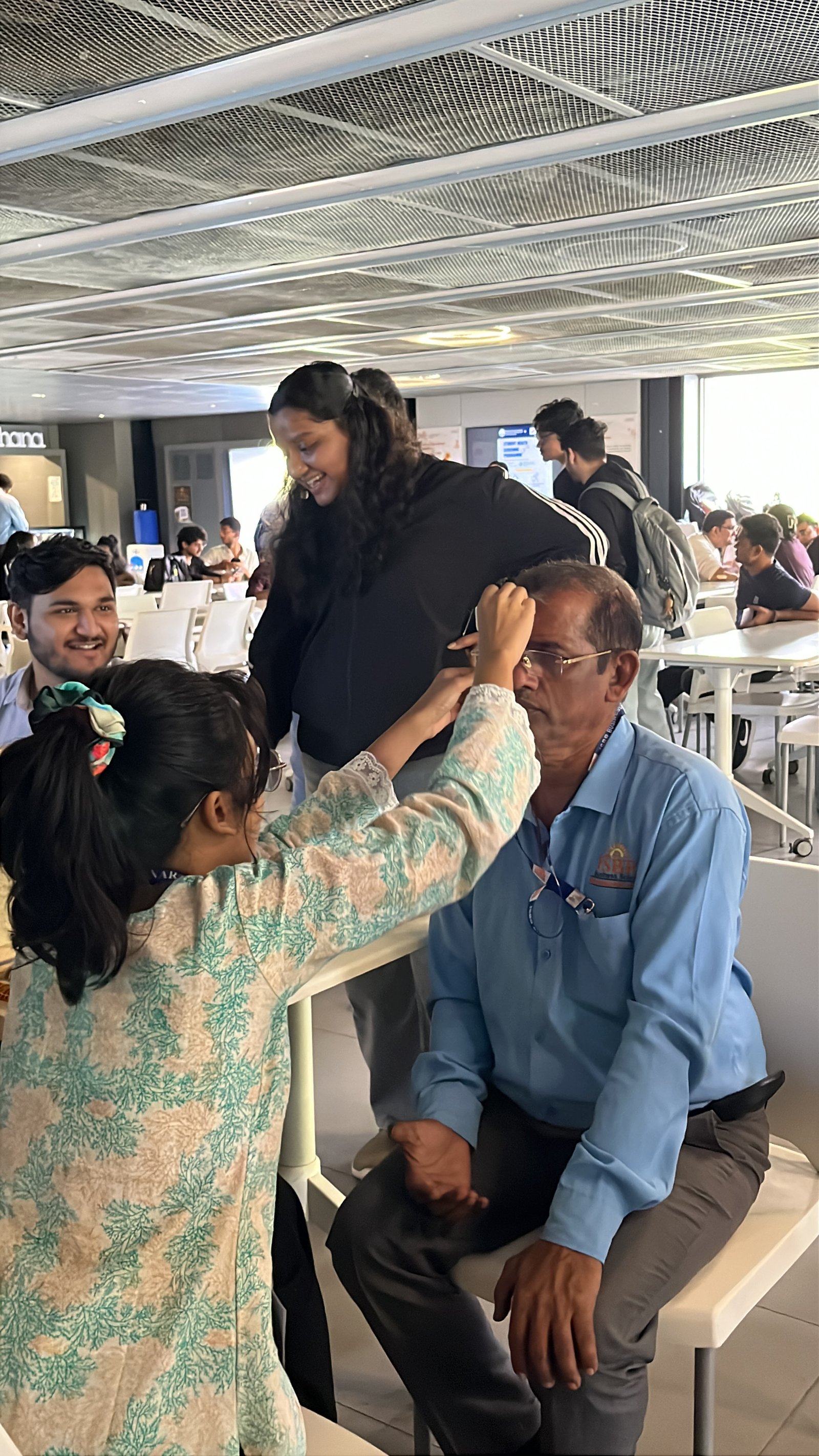 Dental screening with an oral health model demonstration at the camp