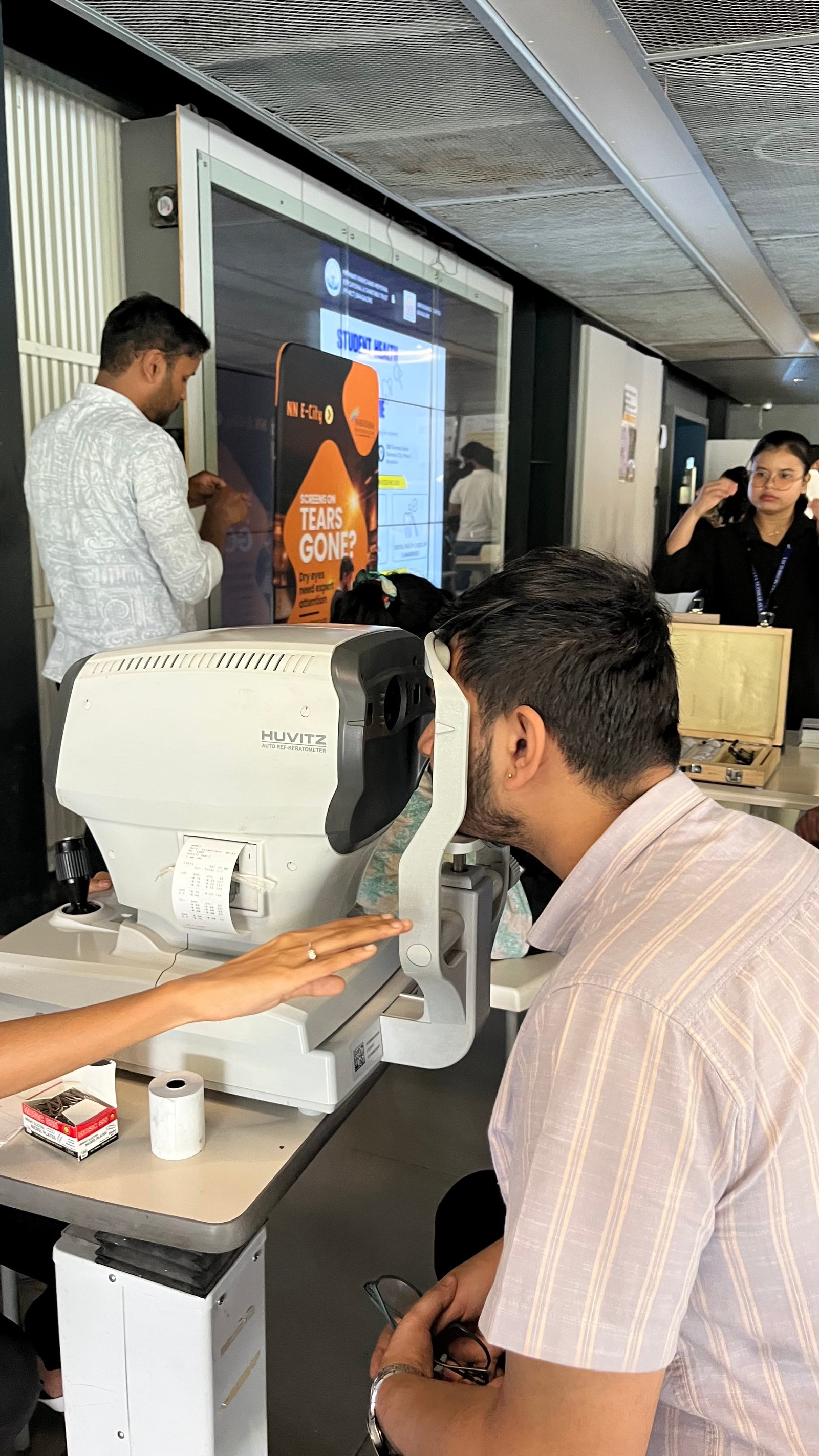Dental screening and record taking at the campus health camp